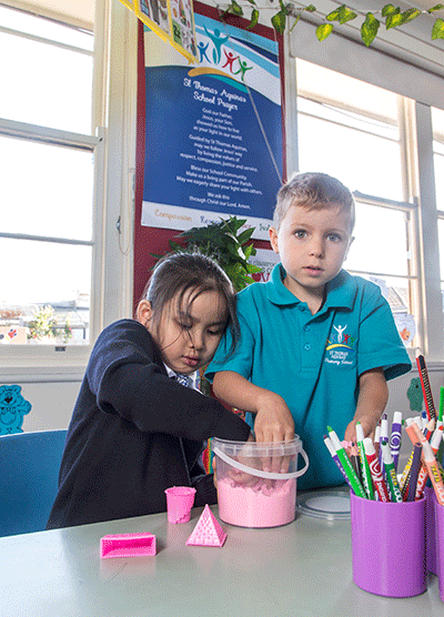 Image of two primary school students at school